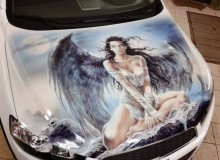 Ангелы и демоны на капот Chevrolet Captiva