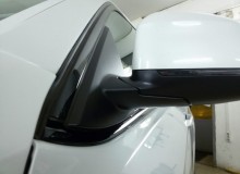 Оклейка хромированных элементов и серых вставок на бамперах в черный глянец на BMW X6!
