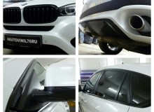 Оклейка хромированных элементов и серых вставок на бамперах в черный глянец на BMW X6!